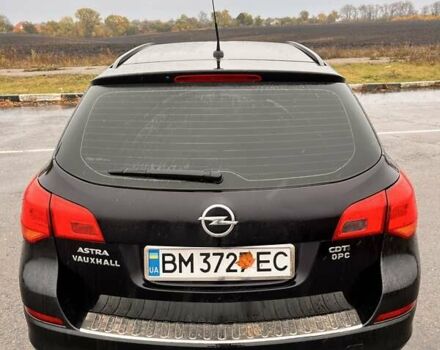 Черный Опель Астра, объемом двигателя 1.7 л и пробегом 252 тыс. км за 6850 $, фото 3 на Automoto.ua
