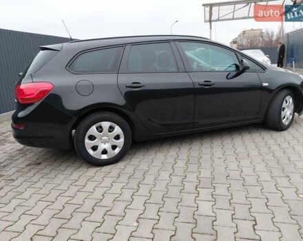 Черный Опель Астра, объемом двигателя 1.25 л и пробегом 1 тыс. км за 6200 $, фото 32 на Automoto.ua