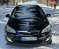 Черный Опель Астра, объемом двигателя 1.6 л и пробегом 230 тыс. км за 7300 $, фото 1 на Automoto.ua