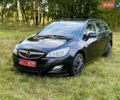 Черный Опель Астра, объемом двигателя 1.6 л и пробегом 177 тыс. км за 7700 $, фото 1 на Automoto.ua