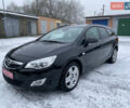 Черный Опель Астра, объемом двигателя 1.6 л и пробегом 230 тыс. км за 7300 $, фото 1 на Automoto.ua