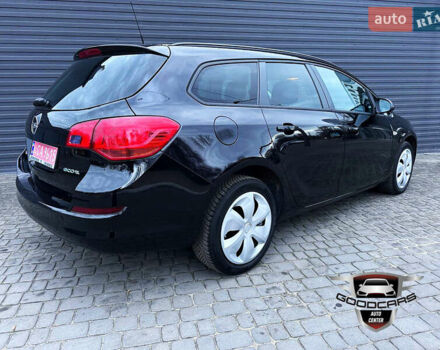 Черный Опель Астра, объемом двигателя 1.4 л и пробегом 180 тыс. км за 7500 $, фото 3 на Automoto.ua