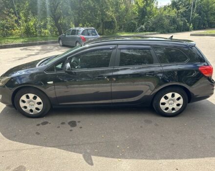 Черный Опель Астра, объемом двигателя 1.2 л и пробегом 345 тыс. км за 5950 $, фото 7 на Automoto.ua
