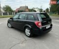 Черный Опель Астра, объемом двигателя 1.6 л и пробегом 170 тыс. км за 6399 $, фото 16 на Automoto.ua