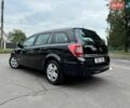Черный Опель Астра, объемом двигателя 1.6 л и пробегом 170 тыс. км за 6399 $, фото 18 на Automoto.ua