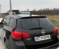 Черный Опель Астра, объемом двигателя 1.25 л и пробегом 230 тыс. км за 4700 $, фото 1 на Automoto.ua