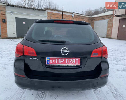 Черный Опель Астра, объемом двигателя 1.6 л и пробегом 230 тыс. км за 7300 $, фото 7 на Automoto.ua