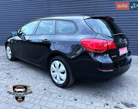 Черный Опель Астра, объемом двигателя 1.4 л и пробегом 180 тыс. км за 7500 $, фото 1 на Automoto.ua