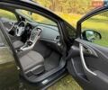 Черный Опель Астра, объемом двигателя 1.6 л и пробегом 177 тыс. км за 7700 $, фото 20 на Automoto.ua