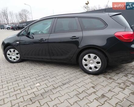 Черный Опель Астра, объемом двигателя 1.25 л и пробегом 1 тыс. км за 6200 $, фото 25 на Automoto.ua