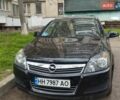 Черный Опель Астра, объемом двигателя 1.8 л и пробегом 142 тыс. км за 7000 $, фото 1 на Automoto.ua