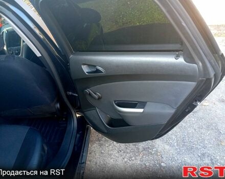 Черный Опель Астра, объемом двигателя 1.7 л и пробегом 315 тыс. км за 6300 $, фото 2 на Automoto.ua