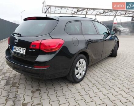 Черный Опель Астра, объемом двигателя 1.25 л и пробегом 1 тыс. км за 6200 $, фото 28 на Automoto.ua