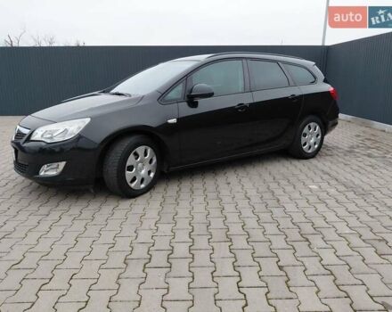 Черный Опель Астра, объемом двигателя 1.25 л и пробегом 1 тыс. км за 6200 $, фото 36 на Automoto.ua