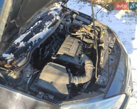 Черный Опель Астра, объемом двигателя 1.4 л и пробегом 229 тыс. км за 8760 $, фото 5 на Automoto.ua