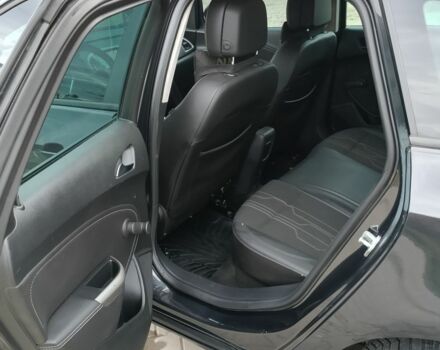 Черный Опель Астра, объемом двигателя 1.7 л и пробегом 2 тыс. км за 6200 $, фото 4 на Automoto.ua