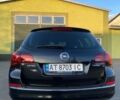 Черный Опель Астра, объемом двигателя 1.4 л и пробегом 191 тыс. км за 9500 $, фото 1 на Automoto.ua