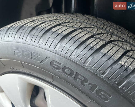 Черный Опель Астра, объемом двигателя 1.4 л и пробегом 210 тыс. км за 5900 $, фото 24 на Automoto.ua