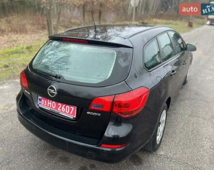 Черный Опель Астра, объемом двигателя 1.4 л и пробегом 210 тыс. км за 5900 $, фото 9 на Automoto.ua