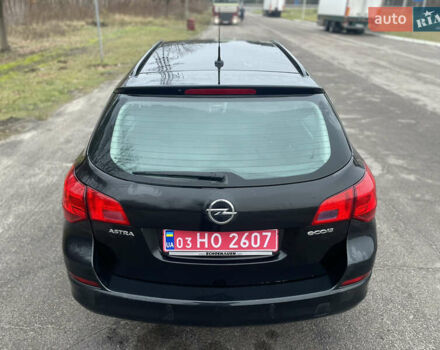 Черный Опель Астра, объемом двигателя 1.4 л и пробегом 210 тыс. км за 5900 $, фото 8 на Automoto.ua