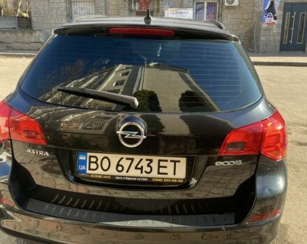 Черный Опель Астра, объемом двигателя 1.7 л и пробегом 260 тыс. км за 7500 $, фото 5 на Automoto.ua