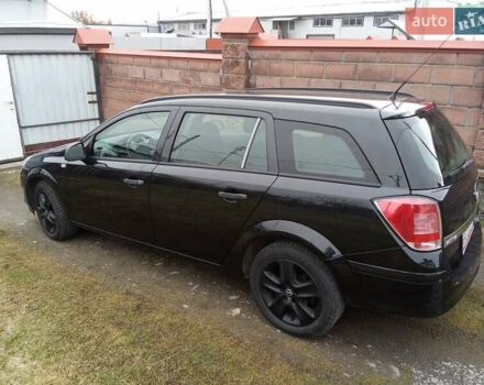 Черный Опель Астра, объемом двигателя 1.69 л и пробегом 260 тыс. км за 5600 $, фото 3 на Automoto.ua