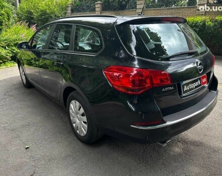 Черный Опель Астра, объемом двигателя 1.4 л и пробегом 180 тыс. км за 6990 $, фото 6 на Automoto.ua