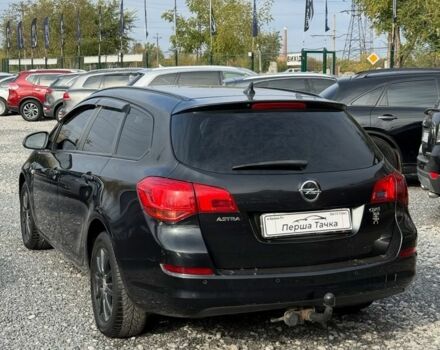 Черный Опель Астра, объемом двигателя 1.7 л и пробегом 212 тыс. км за 7000 $, фото 4 на Automoto.ua