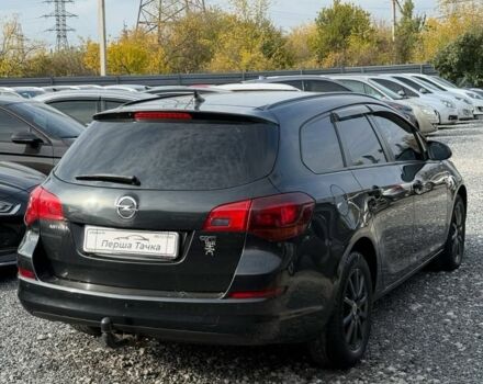 Черный Опель Астра, объемом двигателя 1.7 л и пробегом 212 тыс. км за 7000 $, фото 3 на Automoto.ua