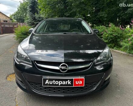 Черный Опель Астра, объемом двигателя 1.4 л и пробегом 180 тыс. км за 6990 $, фото 1 на Automoto.ua