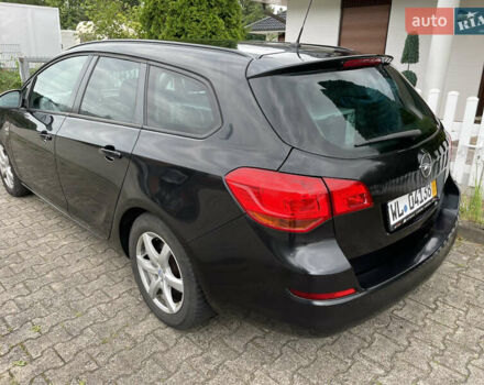 Черный Опель Астра, объемом двигателя 1.7 л и пробегом 230 тыс. км за 5950 $, фото 1 на Automoto.ua