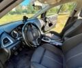 Черный Опель Астра, объемом двигателя 1.7 л и пробегом 231 тыс. км за 7200 $, фото 13 на Automoto.ua