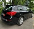 Черный Опель Астра, объемом двигателя 1.4 л и пробегом 180 тыс. км за 6990 $, фото 4 на Automoto.ua