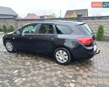 Черный Опель Астра, объемом двигателя 1.7 л и пробегом 185 тыс. км за 6650 $, фото 6 на Automoto.ua