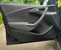 Черный Опель Астра, объемом двигателя 1.4 л и пробегом 180 тыс. км за 6990 $, фото 8 на Automoto.ua