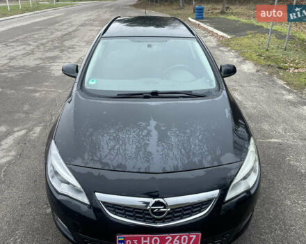 Черный Опель Астра, объемом двигателя 1.4 л и пробегом 210 тыс. км за 5900 $, фото 3 на Automoto.ua