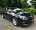Черный Опель Астра, объемом двигателя 1.4 л и пробегом 180 тыс. км за 6990 $, фото 2 на Automoto.ua