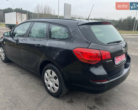 Черный Опель Астра, объемом двигателя 1.4 л и пробегом 210 тыс. км за 5900 $, фото 6 на Automoto.ua
