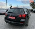 Черный Опель Астра, объемом двигателя 1.4 л и пробегом 220 тыс. км за 7800 $, фото 7 на Automoto.ua