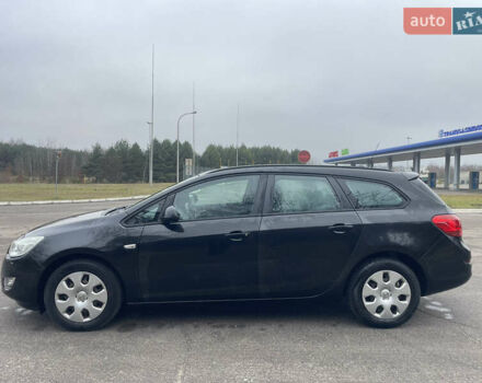 Черный Опель Астра, объемом двигателя 1.4 л и пробегом 210 тыс. км за 5900 $, фото 5 на Automoto.ua