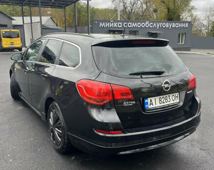 Черный Опель Астра, объемом двигателя 1.7 л и пробегом 275 тыс. км за 7400 $, фото 8 на Automoto.ua