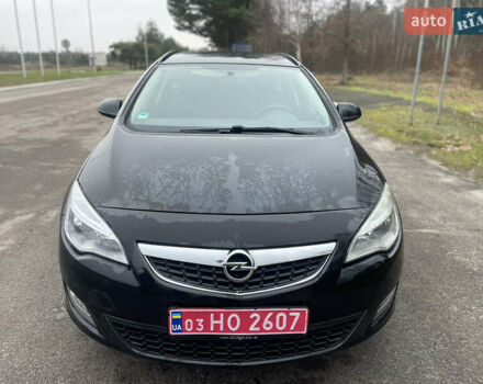 Черный Опель Астра, объемом двигателя 1.4 л и пробегом 210 тыс. км за 5900 $, фото 2 на Automoto.ua