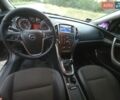 Черный Опель Астра, объемом двигателя 1.3 л и пробегом 184 тыс. км за 7000 $, фото 5 на Automoto.ua