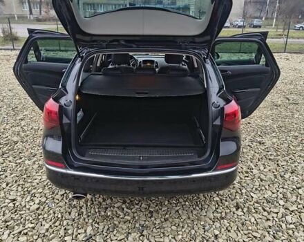 Черный Опель Астра, объемом двигателя 2 л и пробегом 175 тыс. км за 8300 $, фото 7 на Automoto.ua