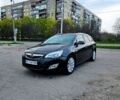 Черный Опель Астра, объемом двигателя 1.2 л и пробегом 263 тыс. км за 5800 $, фото 1 на Automoto.ua