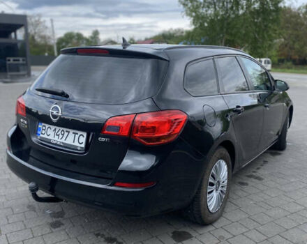 Черный Опель Астра, объемом двигателя 1.7 л и пробегом 265 тыс. км за 6300 $, фото 7 на Automoto.ua