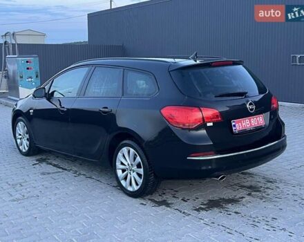 Черный Опель Астра, объемом двигателя 1.4 л и пробегом 275 тыс. км за 7500 $, фото 3 на Automoto.ua