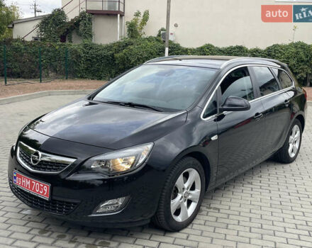 Черный Опель Астра, объемом двигателя 1.6 л и пробегом 125 тыс. км за 7450 $, фото 1 на Automoto.ua