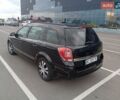 Черный Опель Астра, объемом двигателя 1.7 л и пробегом 270 тыс. км за 5200 $, фото 4 на Automoto.ua