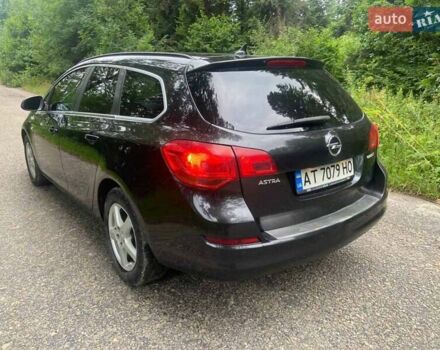 Черный Опель Астра, объемом двигателя 1.3 л и пробегом 284 тыс. км за 5950 $, фото 8 на Automoto.ua